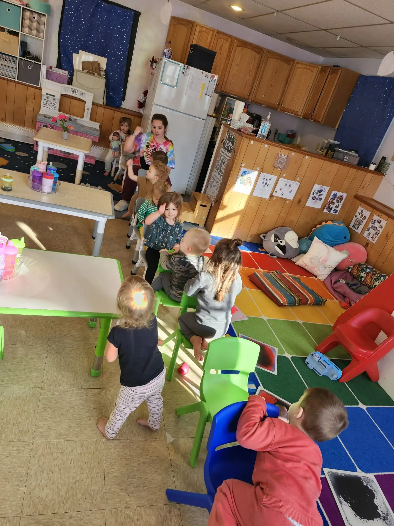 Children and teacher in the playroom